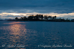 Sailing with Sunset over Yellow Island