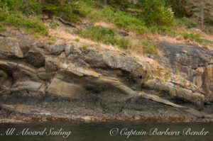 Weathered layered rocks, Flattop Island