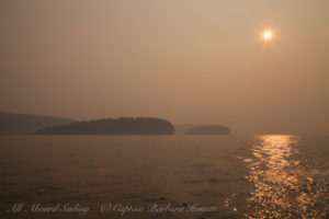 Smoky haze and sunset over the Cactus islands