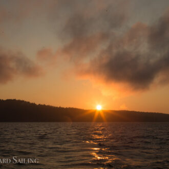 Evening sunset sail mixed with fog